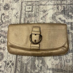 Gold COACH clutch